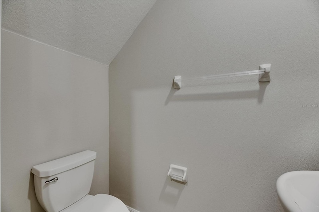 12617 Maple Bonsai Dr, Riverview, FL 33579 - bathroom featuring toilet and a textured ceiling