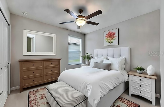 12617 Maple Bonsai Dr, Riverview, FL 33579 - bedroom with light colored carpet, a closet, baseboards, and ceiling fan