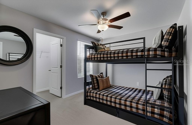 12617 Maple Bonsai Dr, Riverview, FL 33579 - bedroom with carpet floors, baseboards, and a ceiling fan