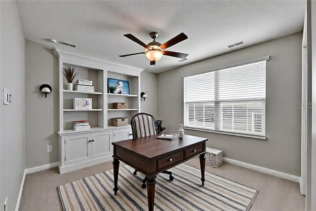 12617 Maple Bonsai Dr, Riverview, FL 33579 - home office with ceiling fan, light carpet, and baseboards