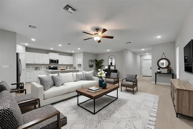 12617 Maple Bonsai Dr, Riverview, FL 33579 - living area with a ceiling fan and recessed lighting