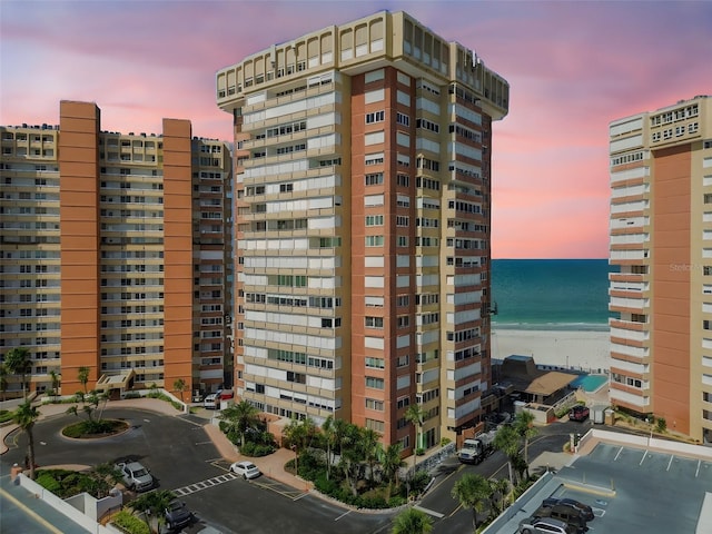 17920 Gulf Blvd Unit 208, Redington Shores, FL 33708 - view of building exterior with a water view