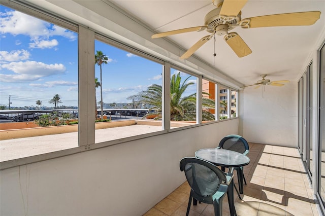 17920 Gulf Blvd Unit 208, Redington Shores, FL 33708 - unfurnished sunroom featuring a ceiling fan