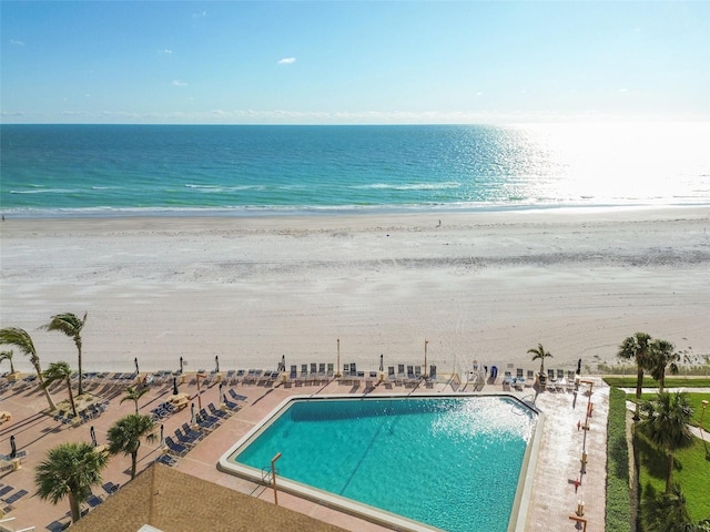 17920 Gulf Blvd Unit 208, Redington Shores, FL 33708 - drone / aerial view of waterfront with a beach and a pool