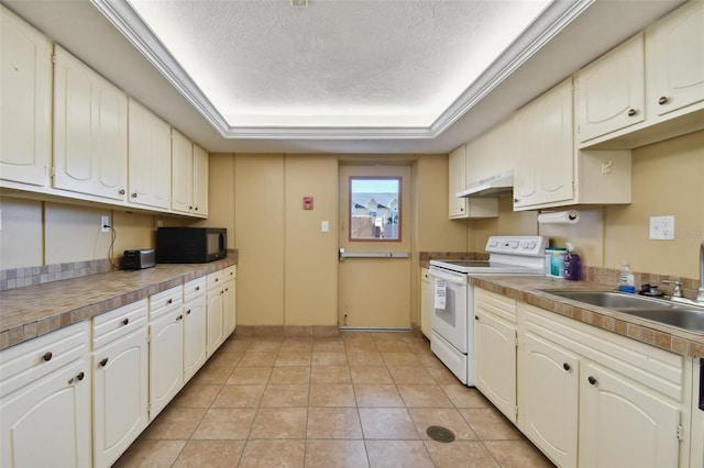 17920 Gulf Blvd Unit 208, Redington Shores, FL 33708 - kitchen featuring white range with electric cooktop, black microwave, under cabinet range hood, a textured ceiling, and a sink