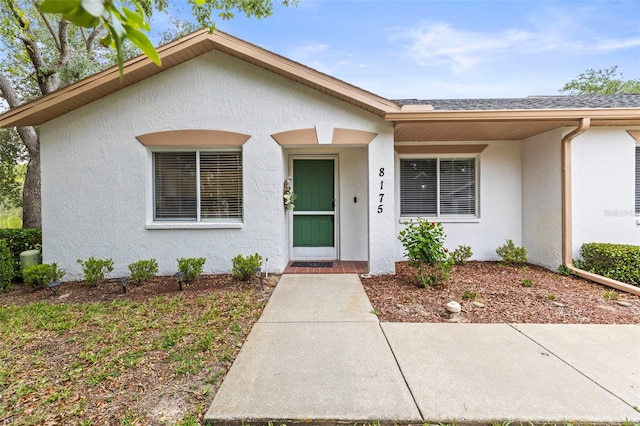 8175 Sturbridge Unit 8175, Weeki Wachee, FL 34613 - view of front of house featuring stucco siding