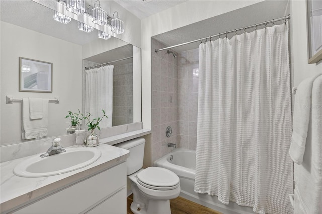 8175 Sturbridge Unit 8175, Weeki Wachee, FL 34613 - full bath featuring vanity, shower / bathtub combination with curtain, and wood finished floors