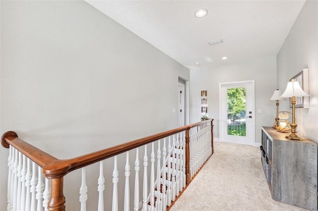 15936 Ternglade Dr, Lithia, FL 33547 - hallway featuring light colored carpet, recessed lighting, baseboards, and an upstairs landing