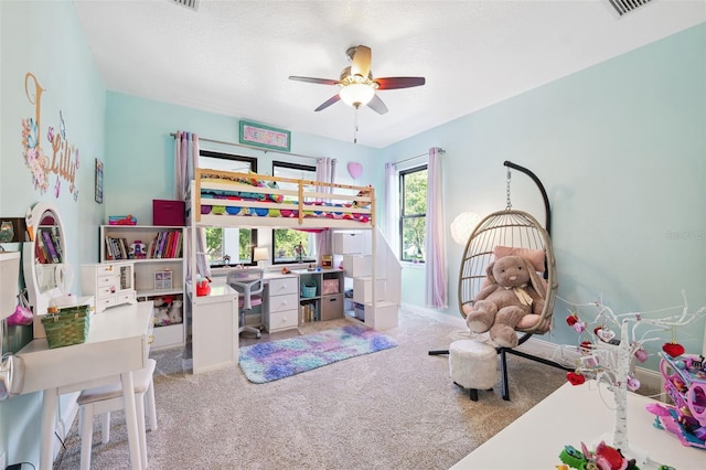 15936 Ternglade Dr, Lithia, FL 33547 - carpeted bedroom with a desk and ceiling fan