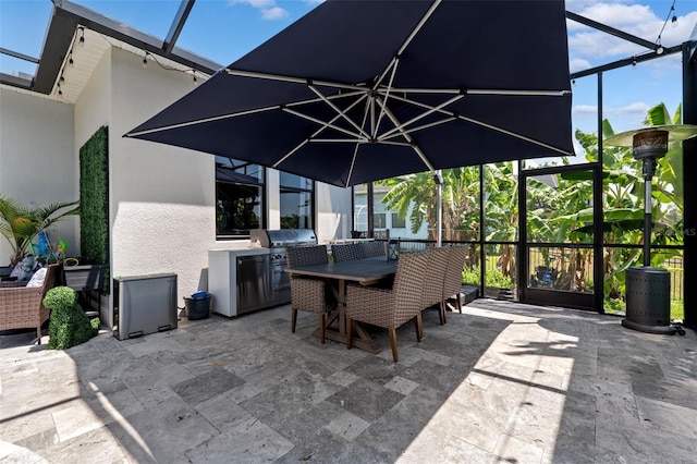 15936 Ternglade Dr, Lithia, FL 33547 - view of patio featuring glass enclosure and outdoor dining area