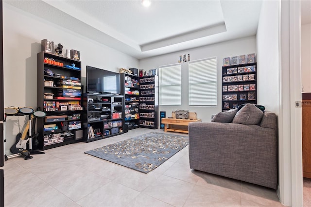 12401 Shining Willow St, Riverview, FL 33579 - living area featuring tile patterned flooring and a raised ceiling