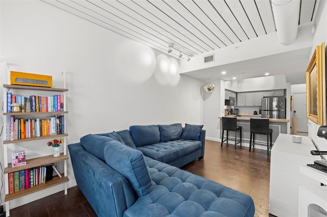 2410 W Azeele St Unit 214, Tampa, FL 33609 - living room featuring dark wood finished floors and recessed lighting