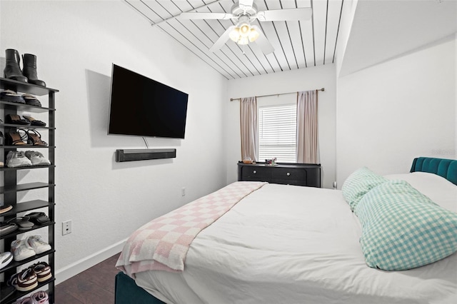 2410 W Azeele St Unit 214, Tampa, FL 33609 - bedroom with dark wood-style floors and baseboards