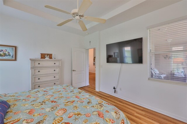 2316 Lyndhurst Dr, Sun City Center, FL 33573 - bedroom with wood finished floors, baseboards, and ceiling fan