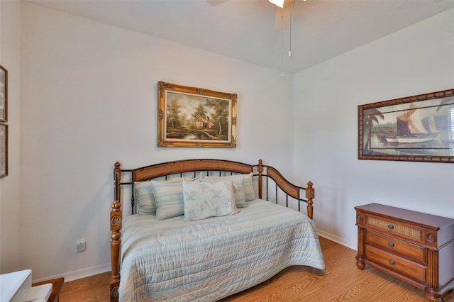2316 Lyndhurst Dr, Sun City Center, FL 33573 - bedroom with wood finished floors, baseboards, and ceiling fan