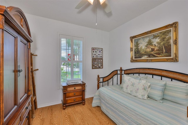 2316 Lyndhurst Dr, Sun City Center, FL 33573 - bedroom featuring light wood-style flooring, baseboards, and a ceiling fan