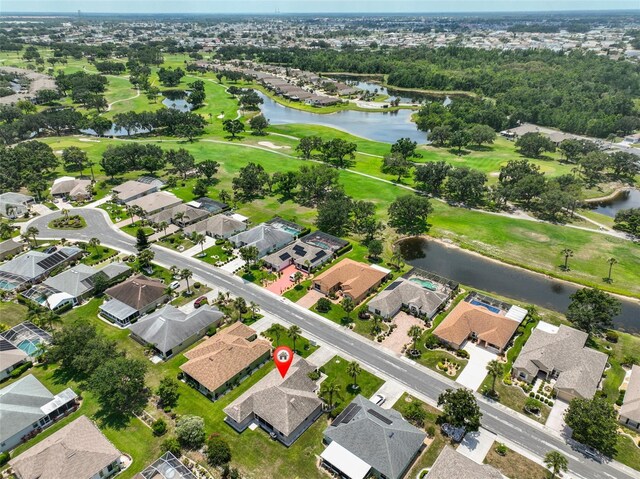 2316 Lyndhurst Dr, Sun City Center, FL 33573 - aerial view of property's location with a nearby body of water, nearby suburban area, and a local golf course