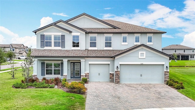 7628 Surf Reed Way, Wesley Chapel, FL 33545 - view of front of property featuring stucco siding, a front lawn, and an attached garage