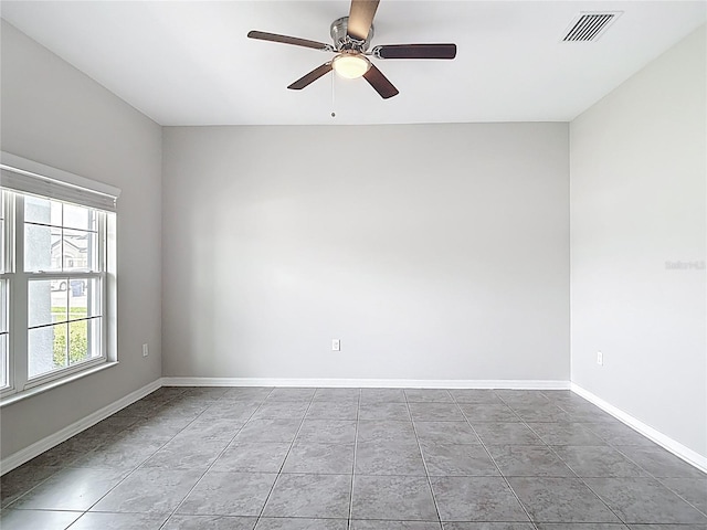 7628 Surf Reed Way, Wesley Chapel, FL 33545 - empty room with ceiling fan and baseboards