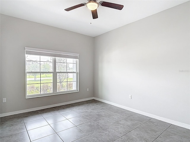 7628 Surf Reed Way, Wesley Chapel, FL 33545 - tiled empty room featuring a ceiling fan and baseboards