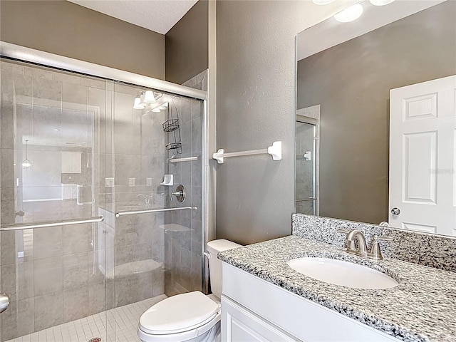 7628 Surf Reed Way, Wesley Chapel, FL 33545 - full bathroom with toilet, vanity, and a stall shower
