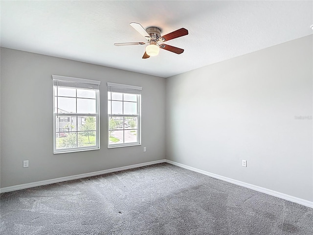 7628 Surf Reed Way, Wesley Chapel, FL 33545 - unfurnished room featuring a ceiling fan, carpet flooring, and baseboards