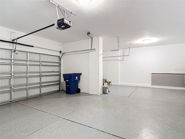 7628 Surf Reed Way, Wesley Chapel, FL 33545 - garage featuring a garage door opener