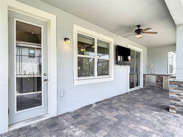 7628 Surf Reed Way, Wesley Chapel, FL 33545 - view of patio / terrace with a ceiling fan and area for grilling