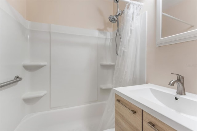 501 E Bay Dr Unit 102, Largo, FL 33770 - bathroom featuring vanity and shower / bath combination with curtain
