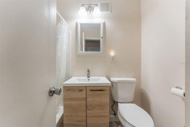 501 E Bay Dr Unit 102, Largo, FL 33770 - bathroom with toilet, vanity, and shower / tub combo