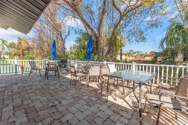 501 E Bay Dr Unit 102, Largo, FL 33770 - view of patio featuring outdoor dining area