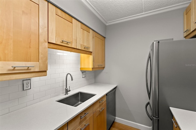 3325 Bayshore Blvd Unit C36, Tampa, FL 33629 - kitchen with stainless steel appliances, a sink, decorative backsplash, light countertops, and a textured ceiling