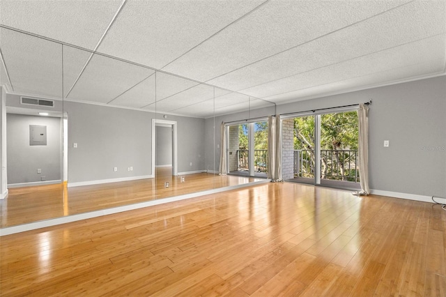 3325 Bayshore Blvd Unit C36, Tampa, FL 33629 - unfurnished living room with baseboards and wood finished floors