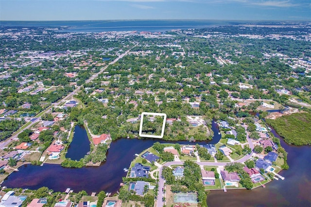 1670 Fox Rd, Clearwater, FL 33764 - aerial view of property and surrounding area featuring a nearby body of water, nearby suburban area, and property parcel outlined