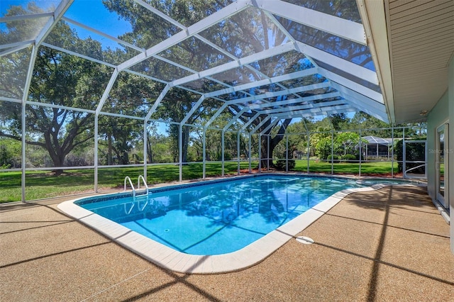 1670 Fox Rd, Clearwater, FL 33764 - outdoor pool with a patio area, view of scattered trees, a yard, and a lanai