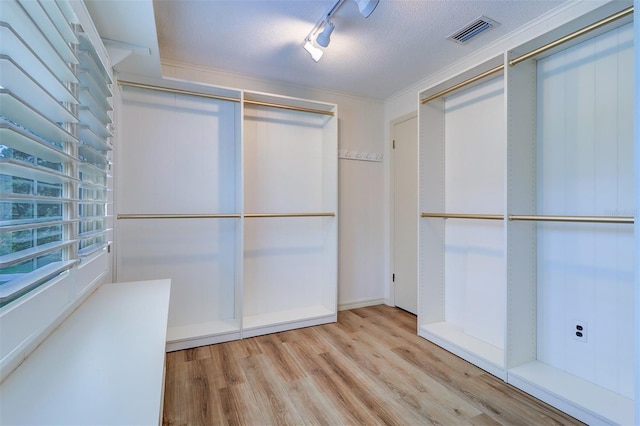 1670 Fox Rd, Clearwater, FL 33764 - spacious closet with wood finished floors