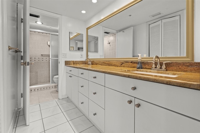 7432 Sunshine Skyway Ln S Unit 402, Saint Petersburg, FL 33711 - full bathroom with toilet, a stall shower, tile patterned floors, double vanity, and recessed lighting
