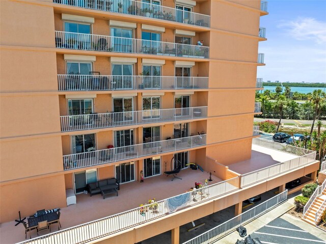 7432 Sunshine Skyway Ln S Unit 402, Saint Petersburg, FL 33711 - view of apartment building / complex featuring a water view