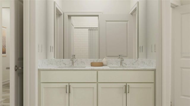 18477 Serene Lake Loop, Lutz, FL 33548 - bathroom featuring double vanity and a shower with shower curtain