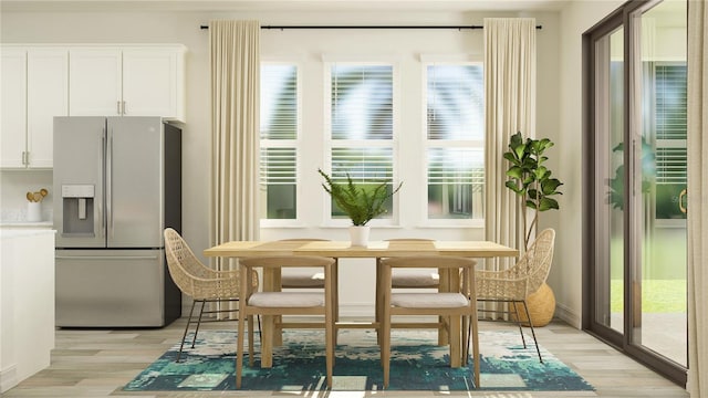 18477 Serene Lake Loop, Lutz, FL 33548 - dining area with light wood finished floors and plenty of natural light