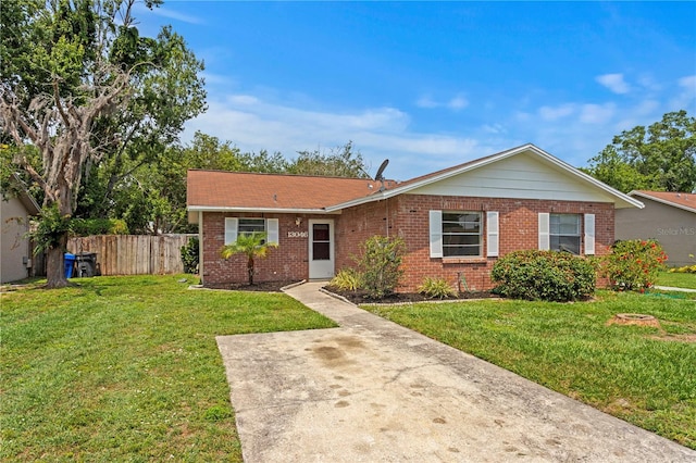 13046 Leverington St, Tampa, FL 33624 - ranch-style house with brick siding