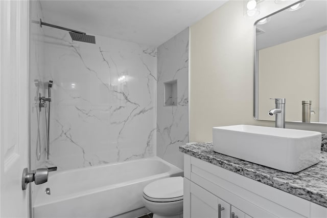 13046 Leverington St, Tampa, FL 33624 - bathroom with vanity, shower / bathtub combination, and toilet