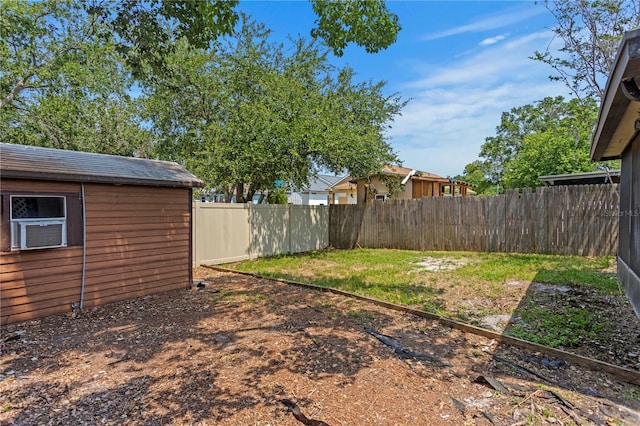 13046 Leverington St, Tampa, FL 33624 - fenced backyard featuring an outdoor structure