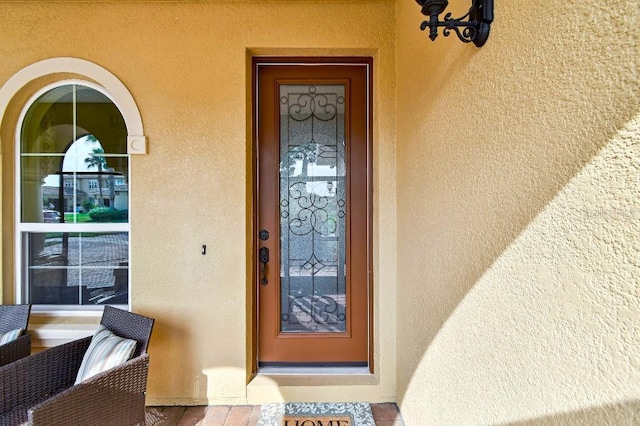 1140 Terralago Way, Kissimmee, FL 34746 - property entrance with stucco siding