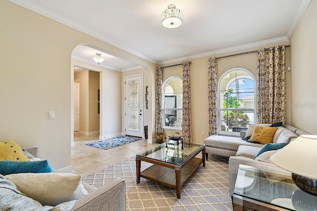 1140 Terralago Way, Kissimmee, FL 34746 - living room with arched walkways, crown molding, and baseboards