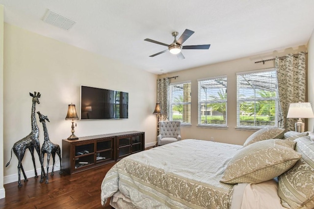 1140 Terralago Way, Kissimmee, FL 34746 - bedroom featuring wood-type flooring, baseboards, and a ceiling fan
