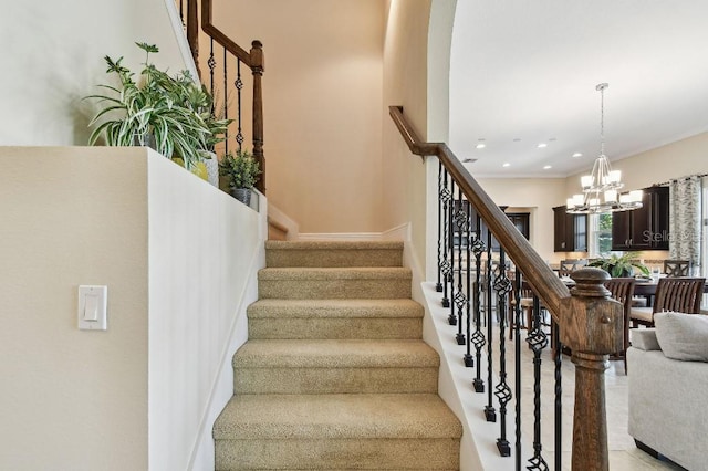 1140 Terralago Way, Kissimmee, FL 34746 - stairs featuring a chandelier and recessed lighting