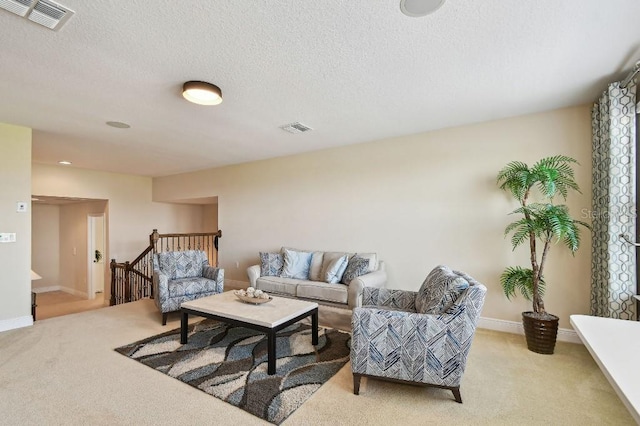 1140 Terralago Way, Kissimmee, FL 34746 - living area featuring light colored carpet, baseboards, and a textured ceiling