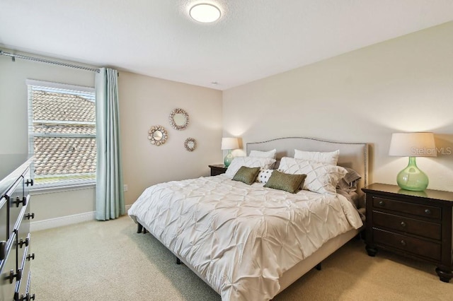 1140 Terralago Way, Kissimmee, FL 34746 - bedroom featuring light colored carpet and baseboards