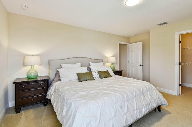 1140 Terralago Way, Kissimmee, FL 34746 - bedroom featuring carpet floors, baseboards, and a spacious closet